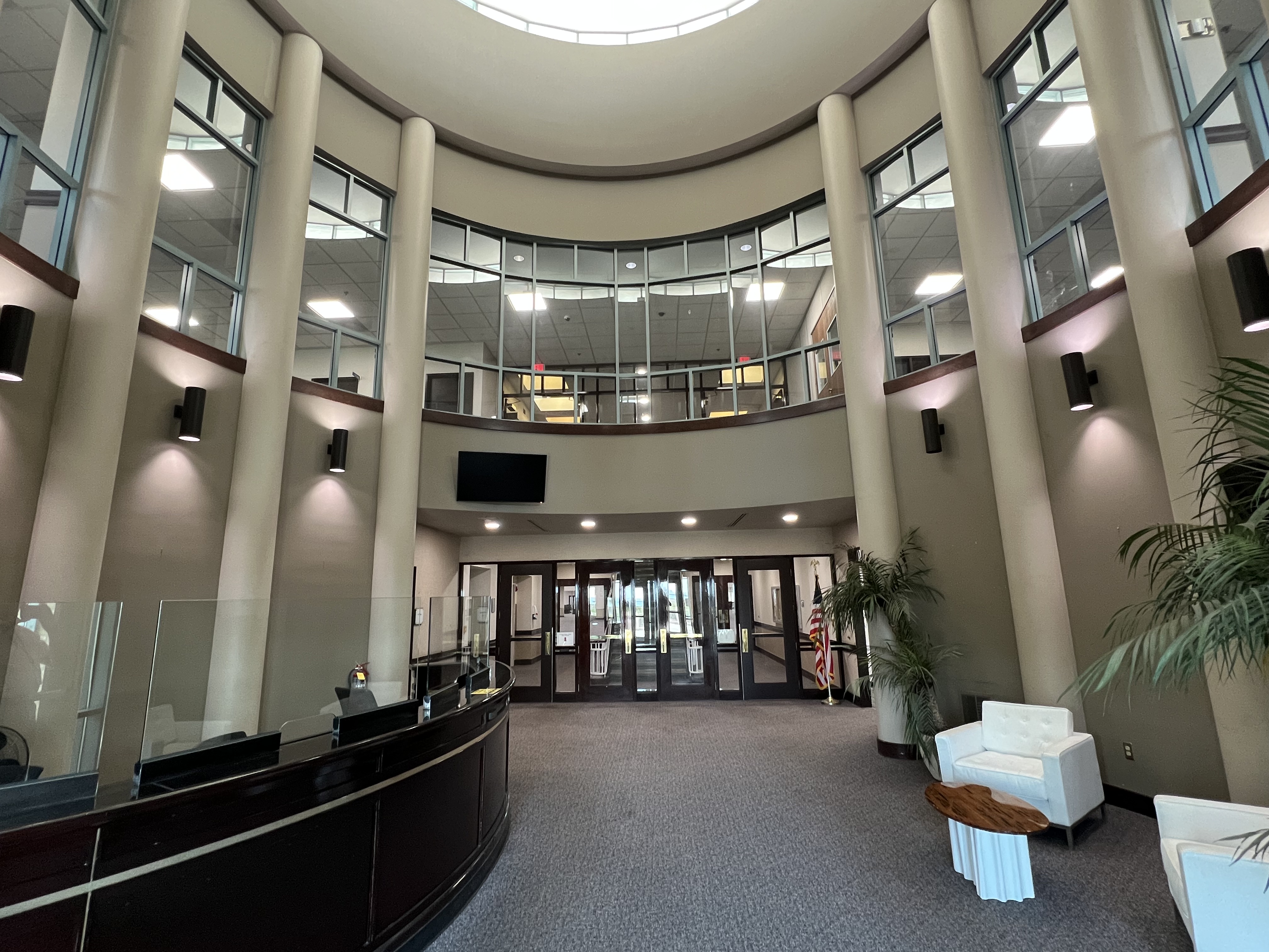 Modern atrium lobby with skylight at The Atlantis Center